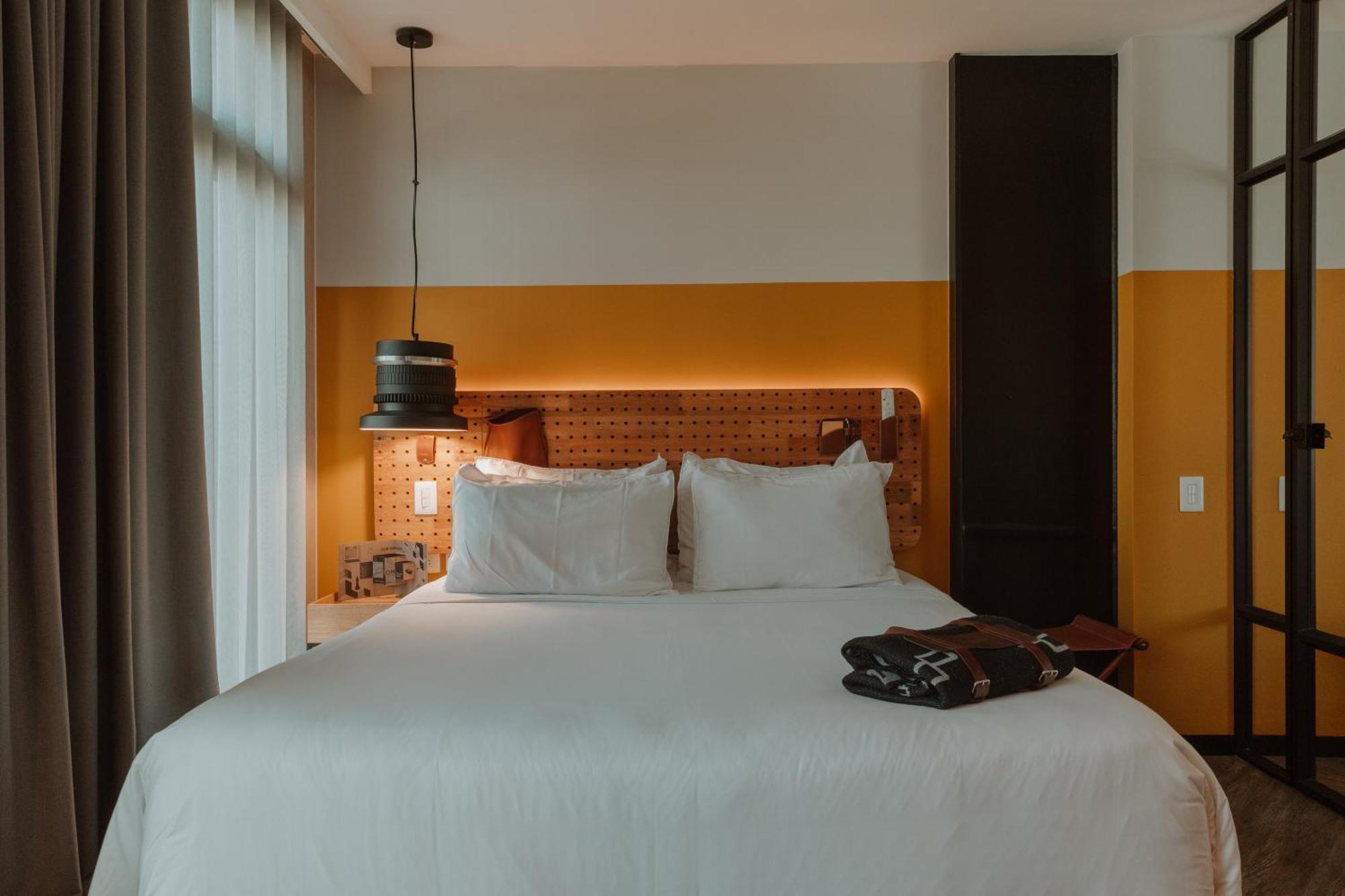The Click Clack Hotel Медельин Экстерьер фото A room at the hotel